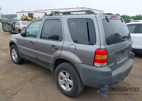 2007 Ford Escape Hybrid z USA, uszkodzony, nr VIN 1FMYU59H97KB06373
